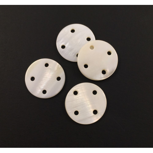 White shell button with four holes